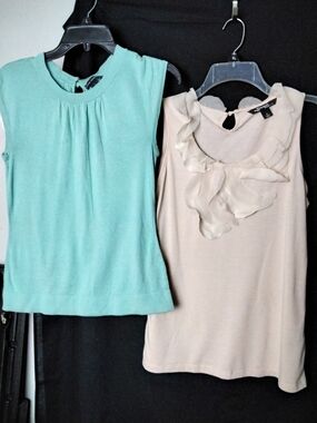 Pair Of Sleeveless Tank Tops